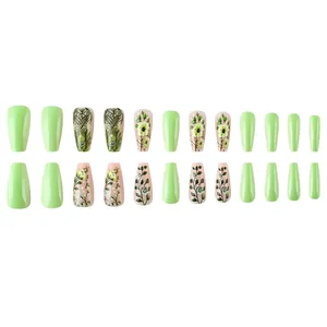 Pastoral green floral press-on nails set in long coffin shape with glossy finish