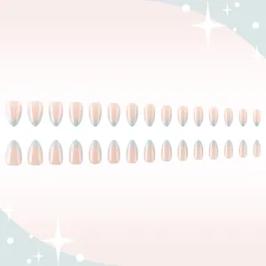French almond press-on nails with nude base and light blue tips, 24 pieces display