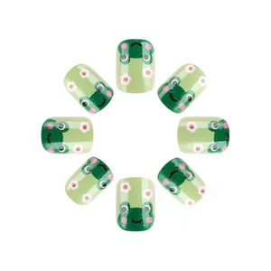 Short glossy press-on nails set with cute green frog and flower patterns for women