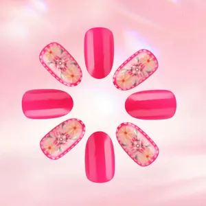 Pink glossy press-on nails set with 3D embossed floral patterns and round oval shape