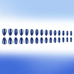Deep blue cat eye press-on nails in medium almond shape with shiny glitter finish