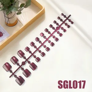 Detail of 24pcs deep wine red cat-eye glitter press-on toenails on plastic stand