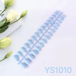 Light blue glossy almond press-on nails set with 24 pieces on a professional display
