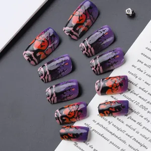 3D Halloween press-on nails set with purple forest and orange pumpkin designs