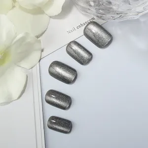 Detailed view of short square silver grey cat eye press-on nails with sparkling magnetic effect