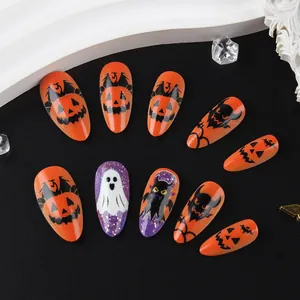 Faux ongles Halloween avec motifs citrouille, fantôme et chauve-souris en amande