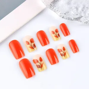 Short square press-on nails set featuring bright red and autumn maple leaf designs