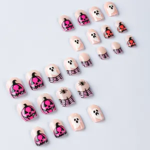 Halloween short square press-on nails with pink pumpkin, ghost, and spider web patterns