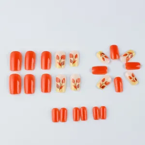 Autumn style 24pcs press-on nails featuring maple leaf patterns and glossy orange finish