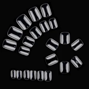 Clear press-on nail tips set with sizes 0-11 in transparent rectangle shape