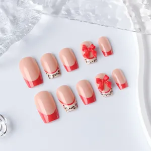 Square red French press-on nails with leopard print and 3D bow accents set