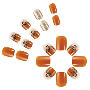 96-piece Halloween pumpkin press-on nail set featuring orange and gold glitter short square nails