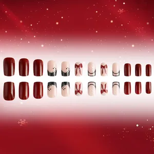Christmas red press-on nails set with festive bow, snowflake patterns and rhinestones
