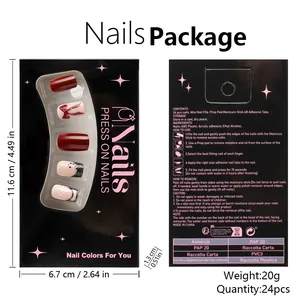 Detailed view of red Christmas press-on nail kit with bow and snowflake designs