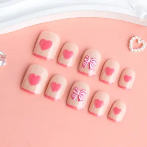 Short square press-on nails with 3D pink bows and French heart designs for women