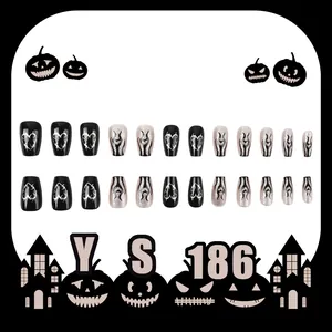 Glossy black heart thorn and flame coffin press-on nails with silver glitter details