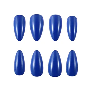 Close-up of glossy royal blue almond-shaped press-on nails with smooth reflective finish
