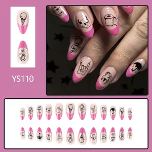 Unghie finte stiletto rosa stile French con disegni graffiti neri a tema Halloween