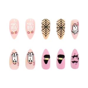 Almond matte Halloween press-on nails with spider web and ghost designs on pink base