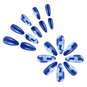 Glossy short blue floral press-on nails with almond shape design in a 24-piece set