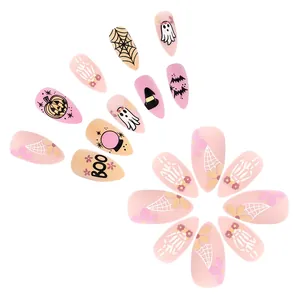Almond Halloween press-on nails featuring matte ghost, spider web and pumpkin designs
