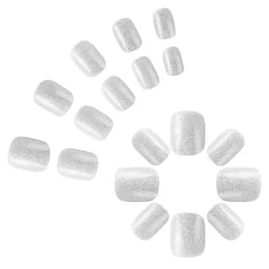Silver glitter press-on nail set with short square round shape on white background