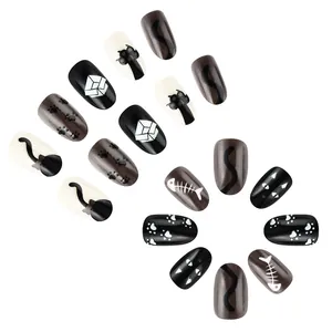 Set fai-da-te di 96 unghie finte a tema gatto con eleganti motivi lucidi nero e bianco