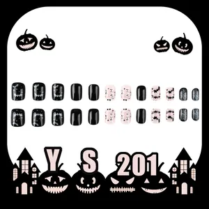 Glossy Halloween press-on nails featuring silver bats and skull designs in 24-piece set