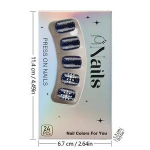 Short press-on nails set with blue glitter snowflake design and packaging dimensions