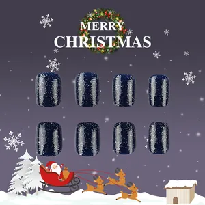 Short square navy blue glitter false nails with silver sparkles for Christmas styling
