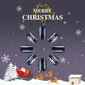 Short dark blue glitter press-on nails with white snowflake patterns for Christmas