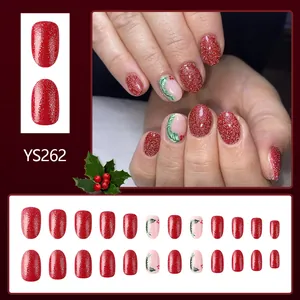 Christmas press-on nails with red glitter and hand-painted green leaf designs 24pcs set