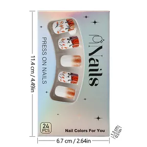 Detailed view of pumpkin and maple leaf press-on nails with packaging dimensions