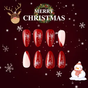 Short glossy red and white French press-on nails with snowflakes for Christmas theme