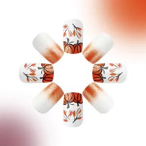 Halloween pumpkin press-on nails with autumn golden leaves and glitter gradient design
