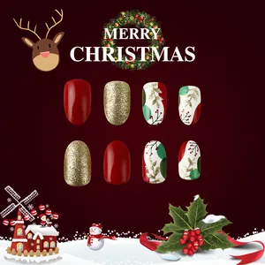Short glossy French Christmas press-on nails with red, gold glitter, and leaf patterns
