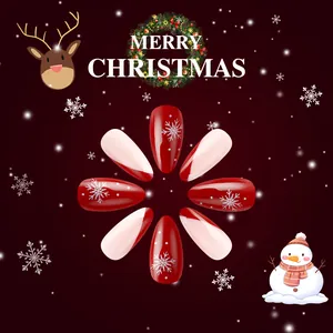 Short glossy Christmas press-on nails with red and white snowflake almond designs