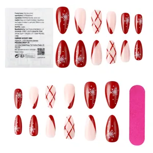 Short glossy red and white French press-on nails with snowflakes and glitter