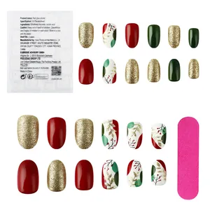 Short festive Christmas press-on nails set with red, green, gold glitter, and leaf patterns