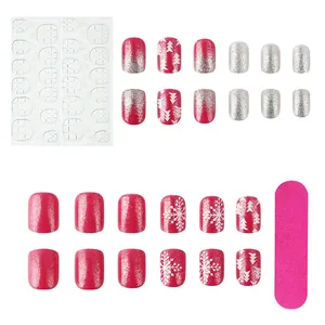 Christmas press-on nails set with snowflake designs, glitter pink finish and tool kit