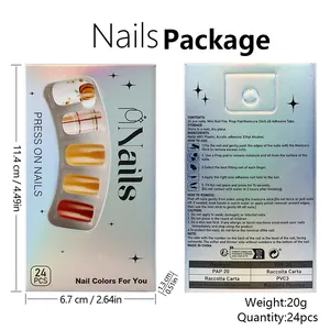 Detail view of pumpkin plaid press-on nails set with holographic packaging and instructions