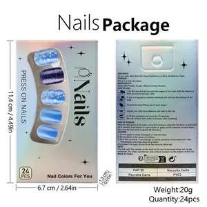 Short square blue press-on nails with snowflakes, glitter, and silver laser box packaging