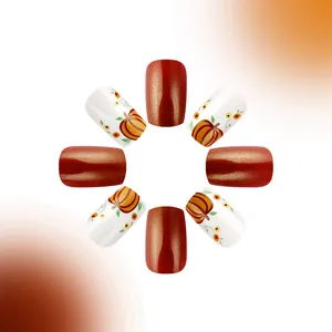 Short square pumpkin orange press-on nails with autumn glitter and plaid flower patterns