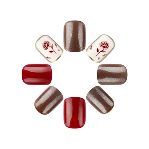 Short square press-on nails with red rose floral patterns and cat-eye glitter finish