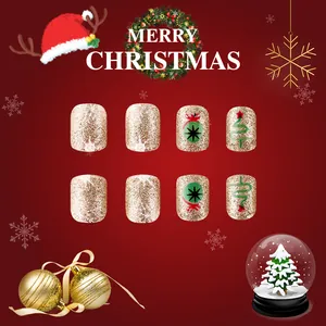 Faux ongles courts carrés de Noël avec paillettes dorées, flocons et sapins blancs