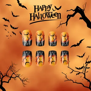 Faux ongles carrés courts Halloween avec dégradé orange et motifs de chauves-souris noires