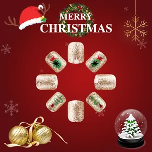 Faux ongles courts carrés à paillettes dorées avec sapin de Noël vert et motifs rouges