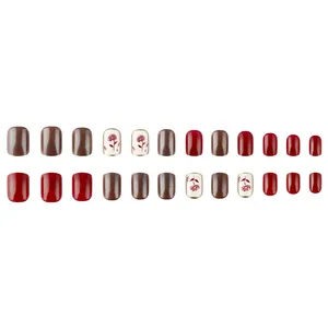 Short glossy square press-on nails with red rose motifs and glitter accents set