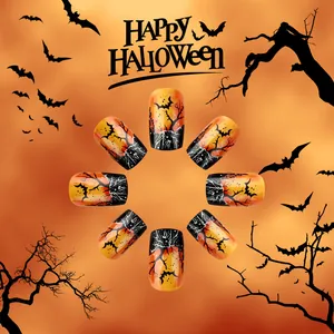 Faux ongles carrés courts Halloween avec dégradé noir orange et motifs de chauves-souris