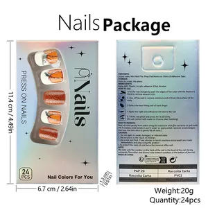 Detail view of pumpkin themed press-on nail kit packaging with tools and dimensions